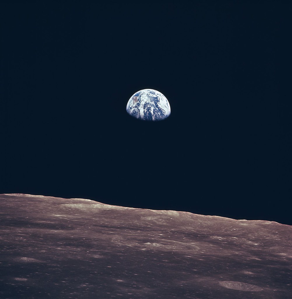 Earth rise seen from the surface of the Moon.
