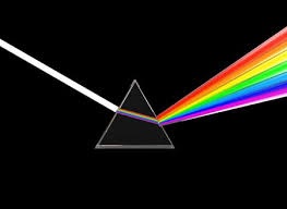 A prism separating light into a rainbow.